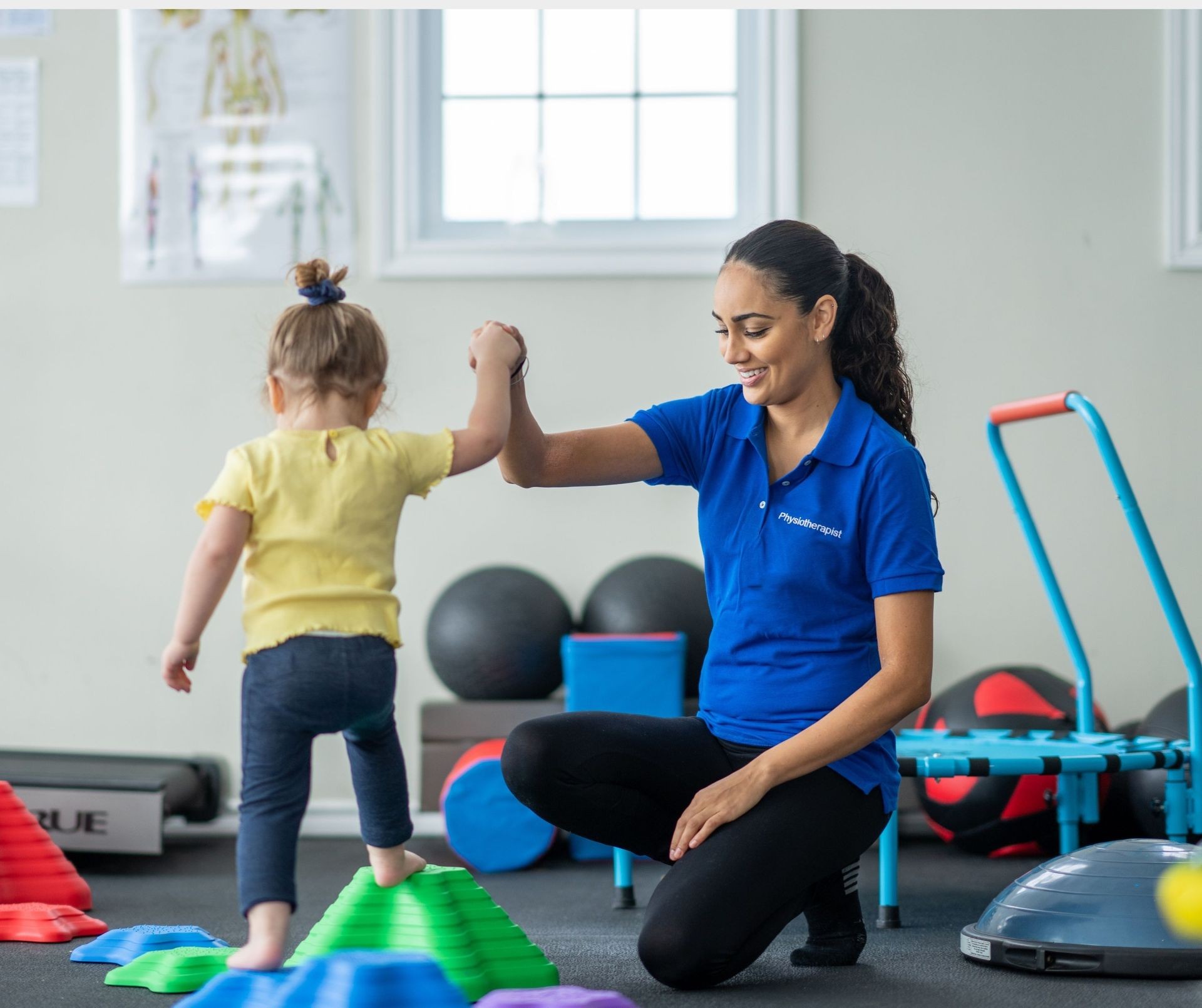 Kid taking physiotherapy